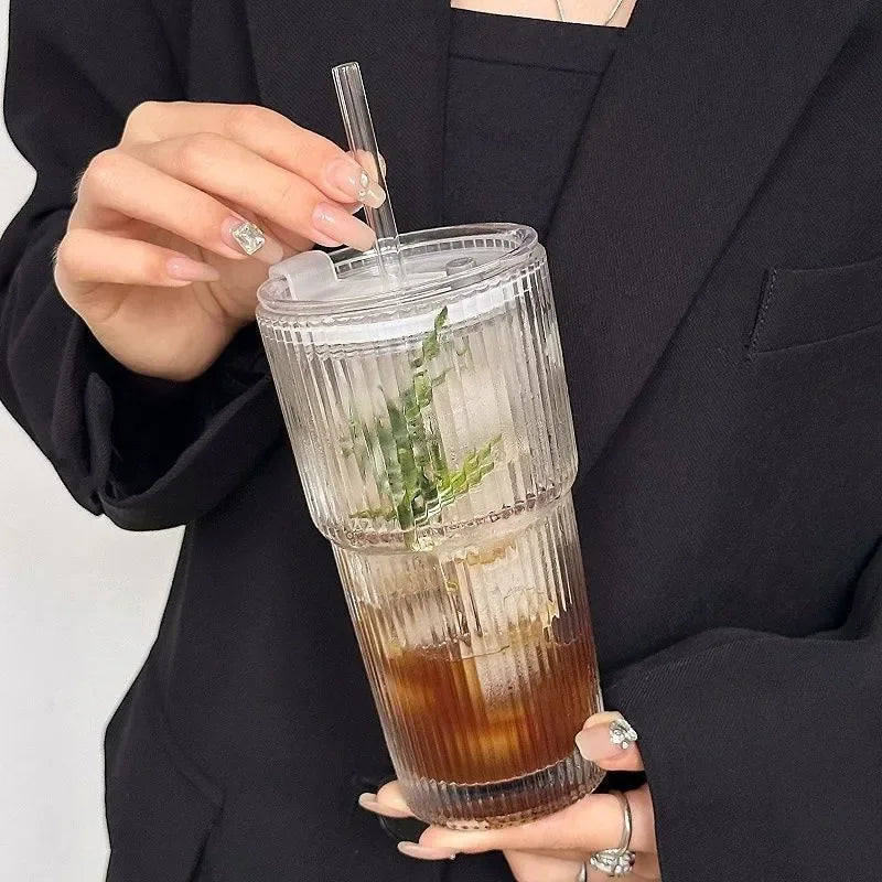 Striped glass coffee cup side view